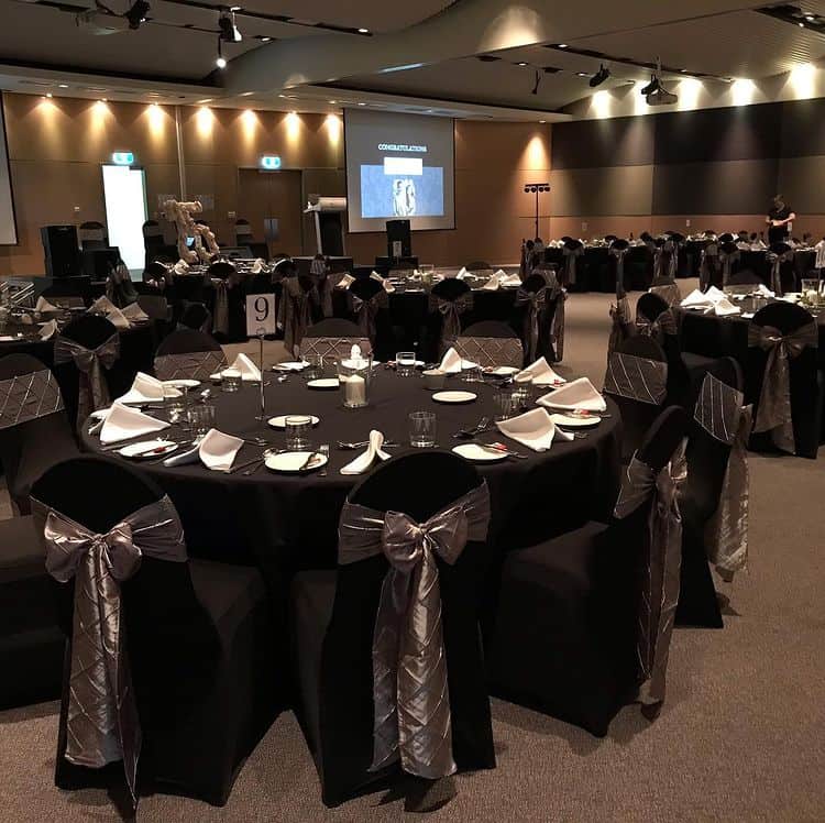 One of the rooms in the conference centre set up for a corporate banquet.